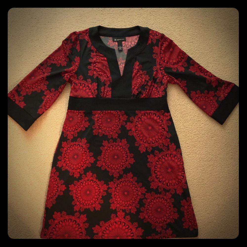 Sunburst knee-length dress.
